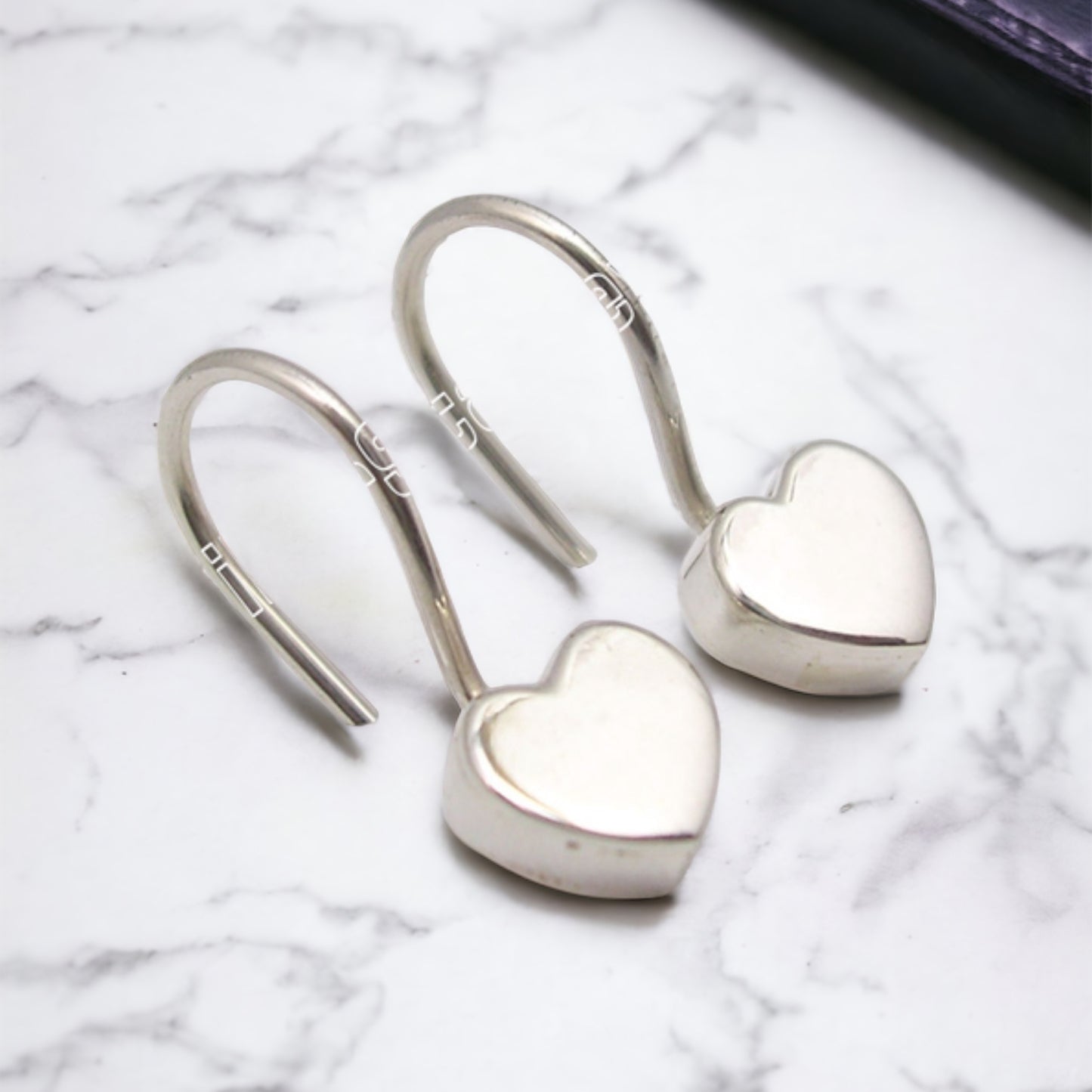 Heart shaped sterling silver earrings